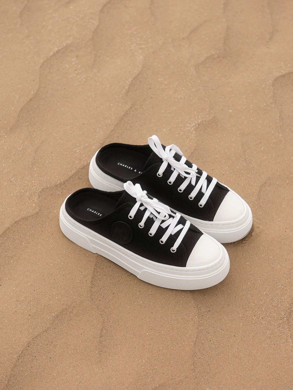 Black canvas outlet slip on shoes
