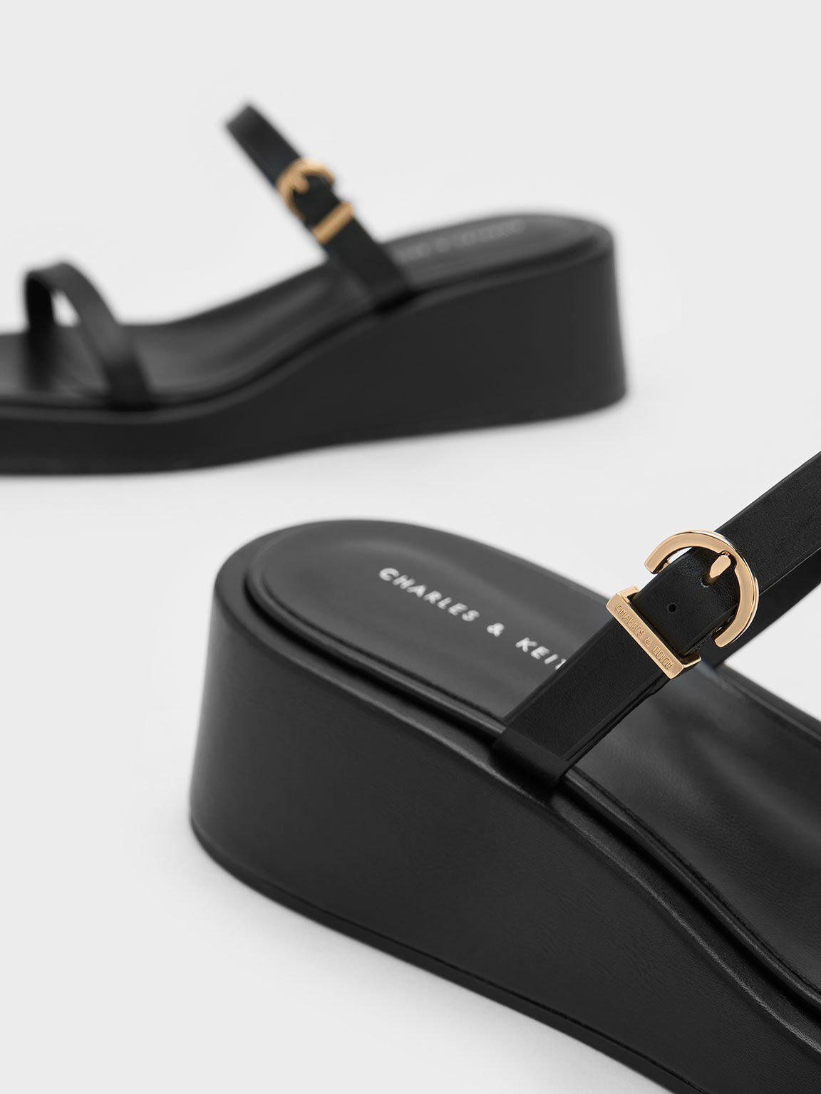 Thin store strap mules