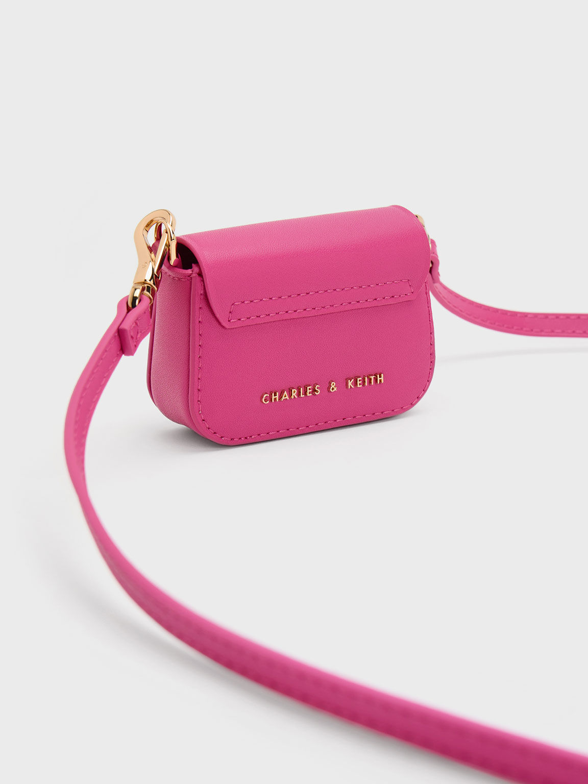 Fuchsia Micro Koa Crossbody Bag CHARLES KEITH IN