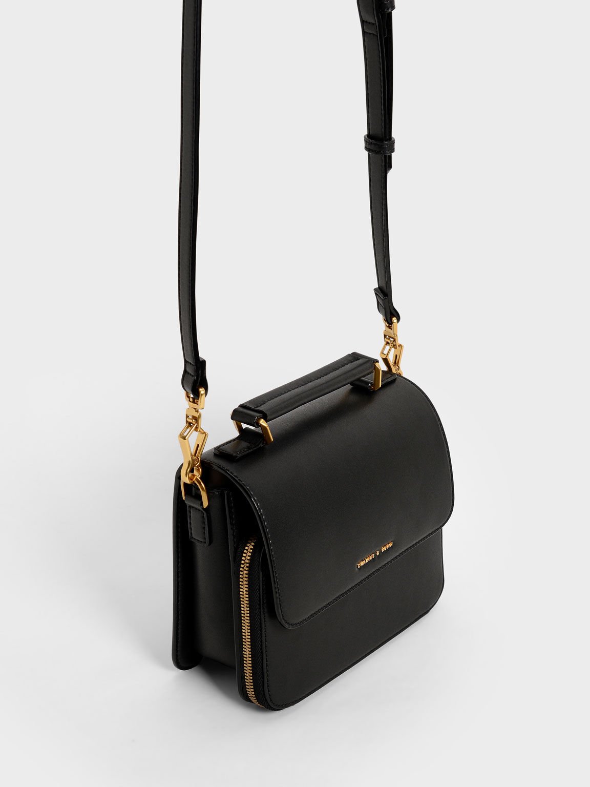 Charles and keith front flap crossbody on sale