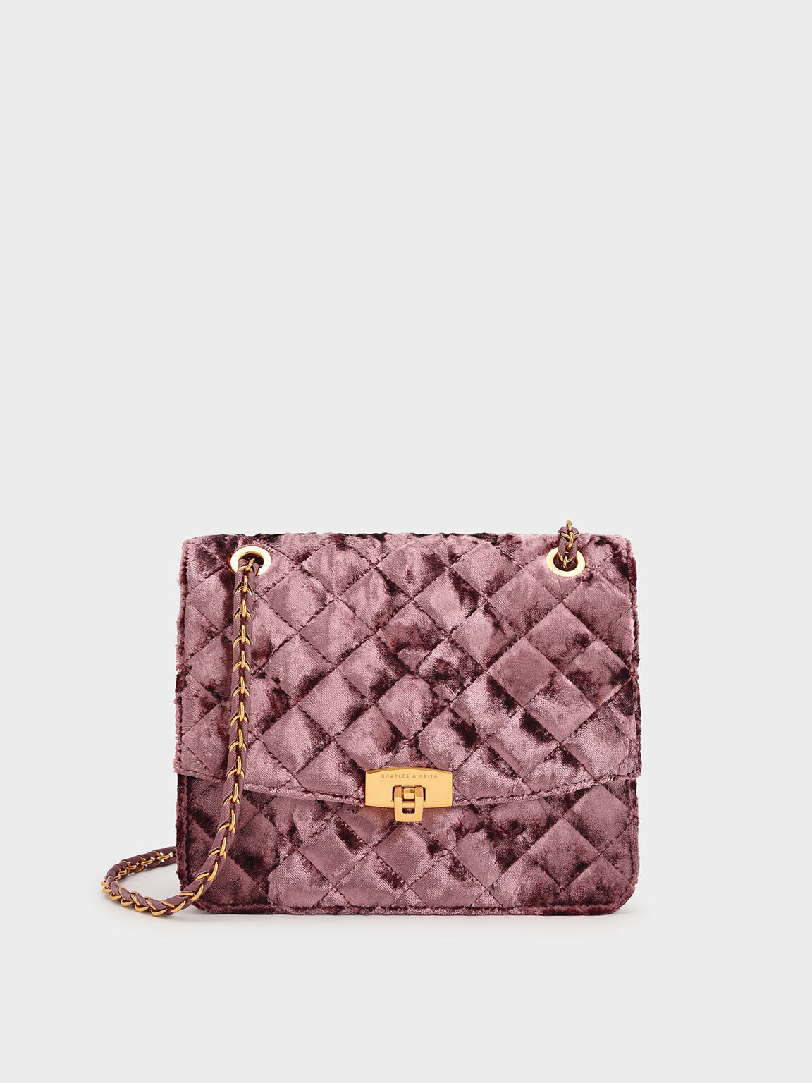Mauve Velvet Quilted Push Lock Clutch Bag CHARLES KEITH IN