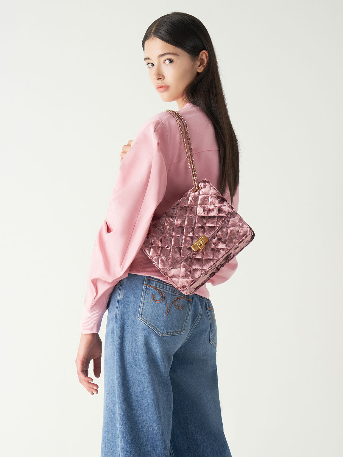 Mauve Velvet Quilted Push Lock Clutch Bag CHARLES KEITH IN