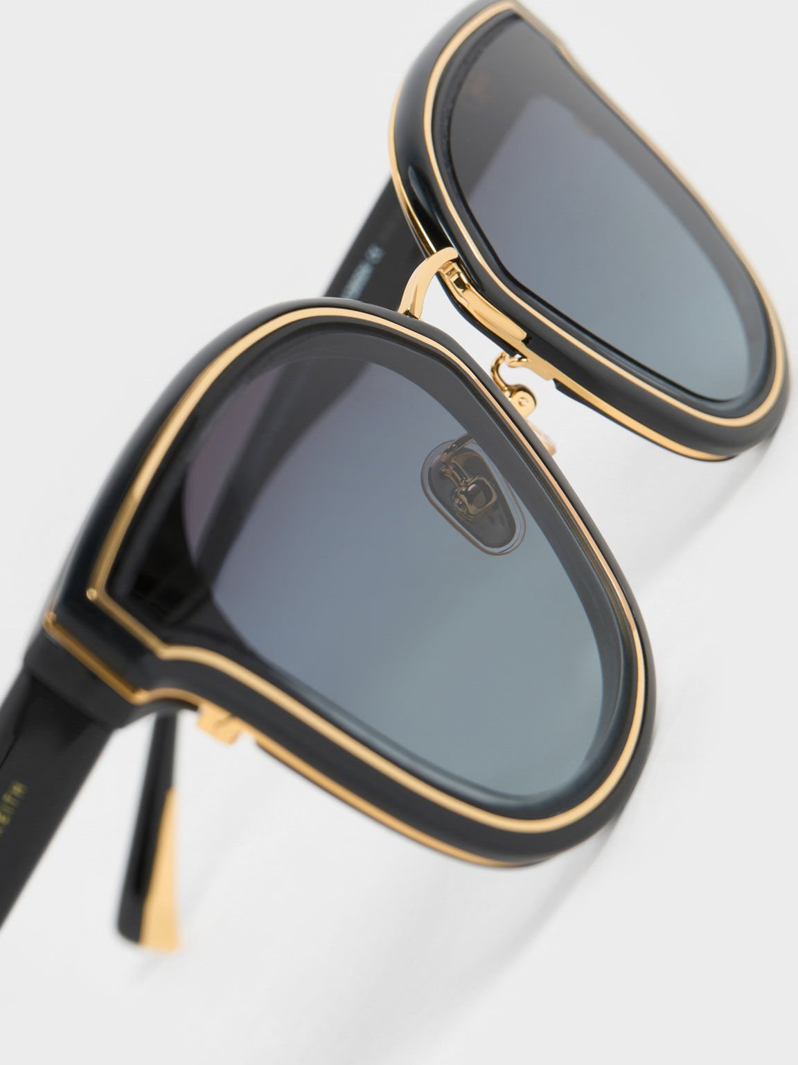 Black sunglasses with gold trim clearance