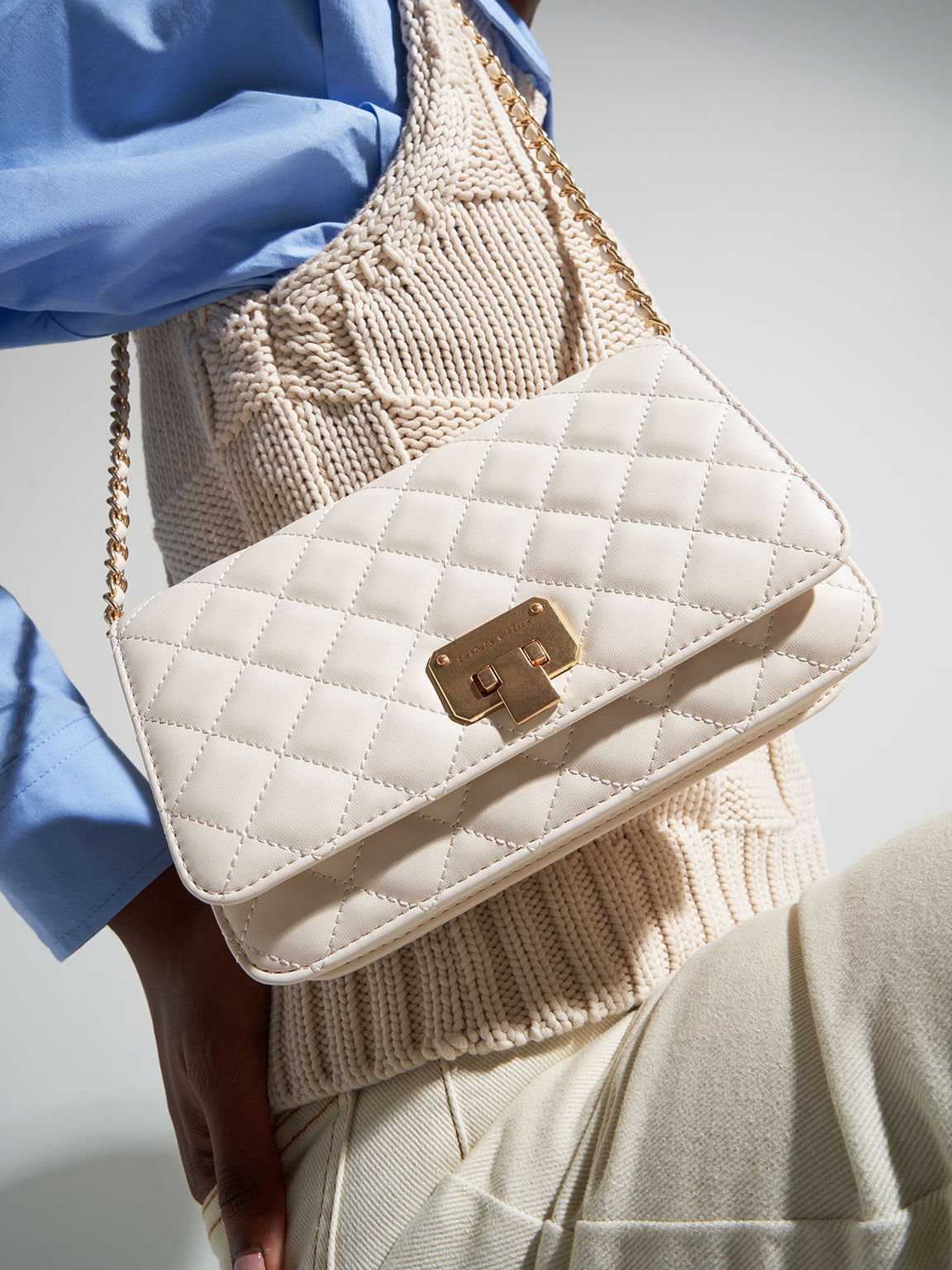 Cream Quilted Push Lock Clutch CHARLES KEITH IN