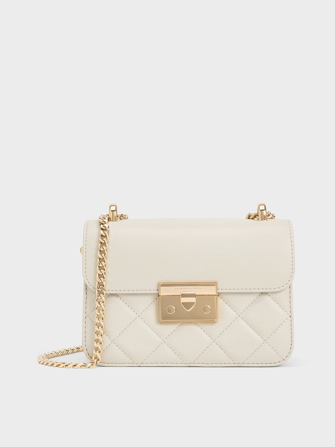 Ivory Quilted Push Lock Chain Handle Bag CHARLES KEITH IN