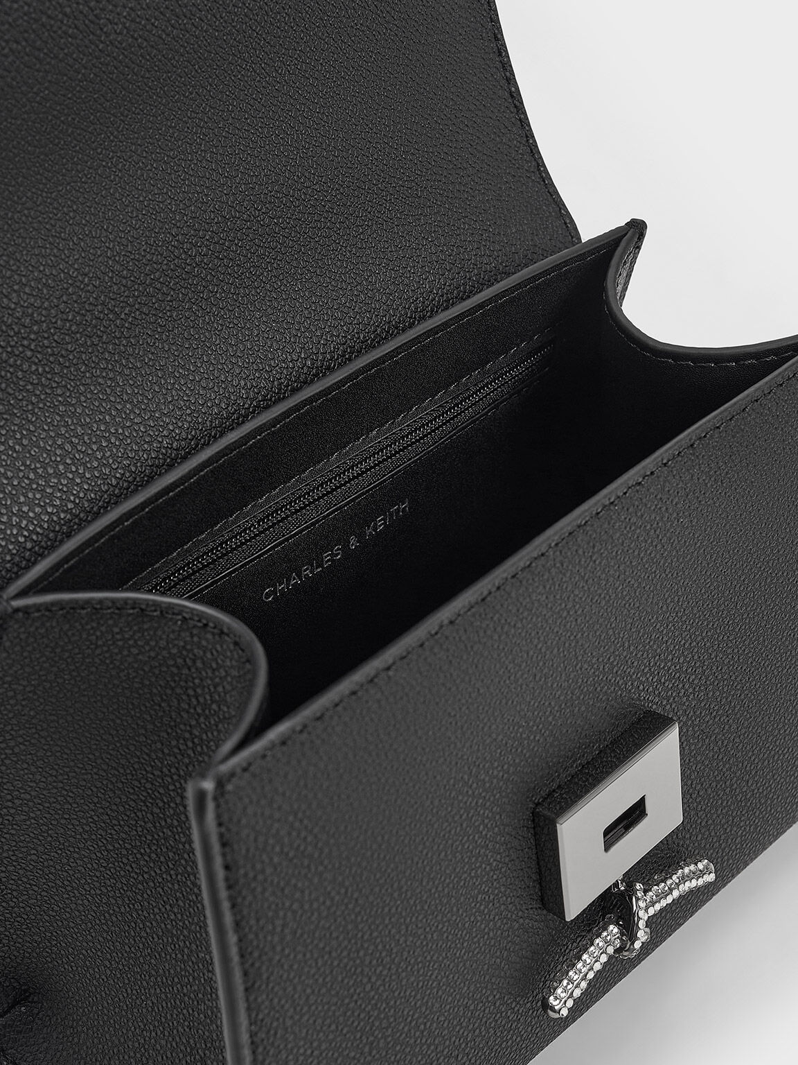 Charles and keith metallic push lock bag online