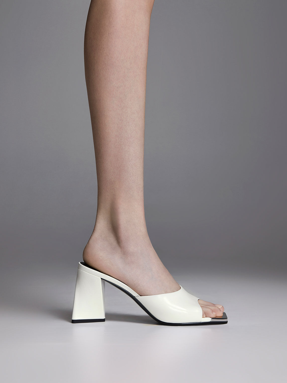 White Metallic Cap Sculptural Heel Mules CHARLES KEITH IN