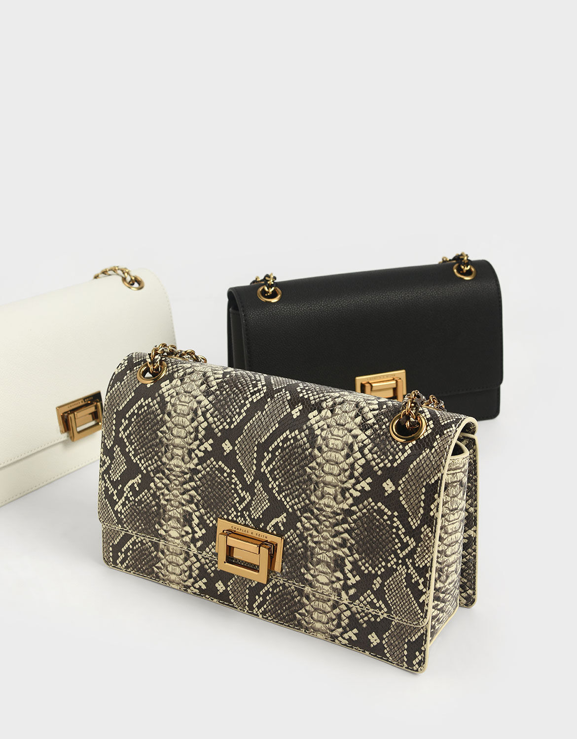 Charles and keith snake print bag sale