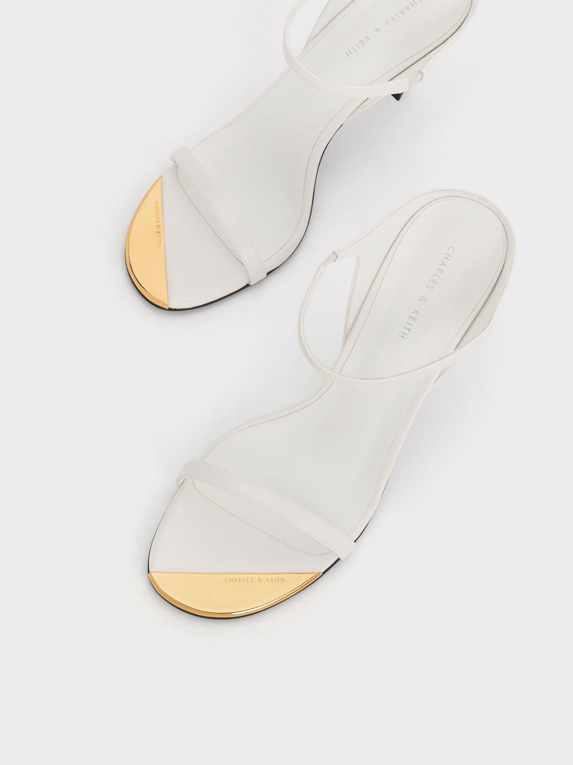 White deals stiletto mules