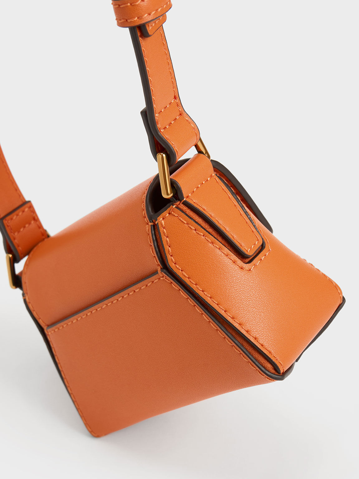 Charles and keith orange sling bag outlet