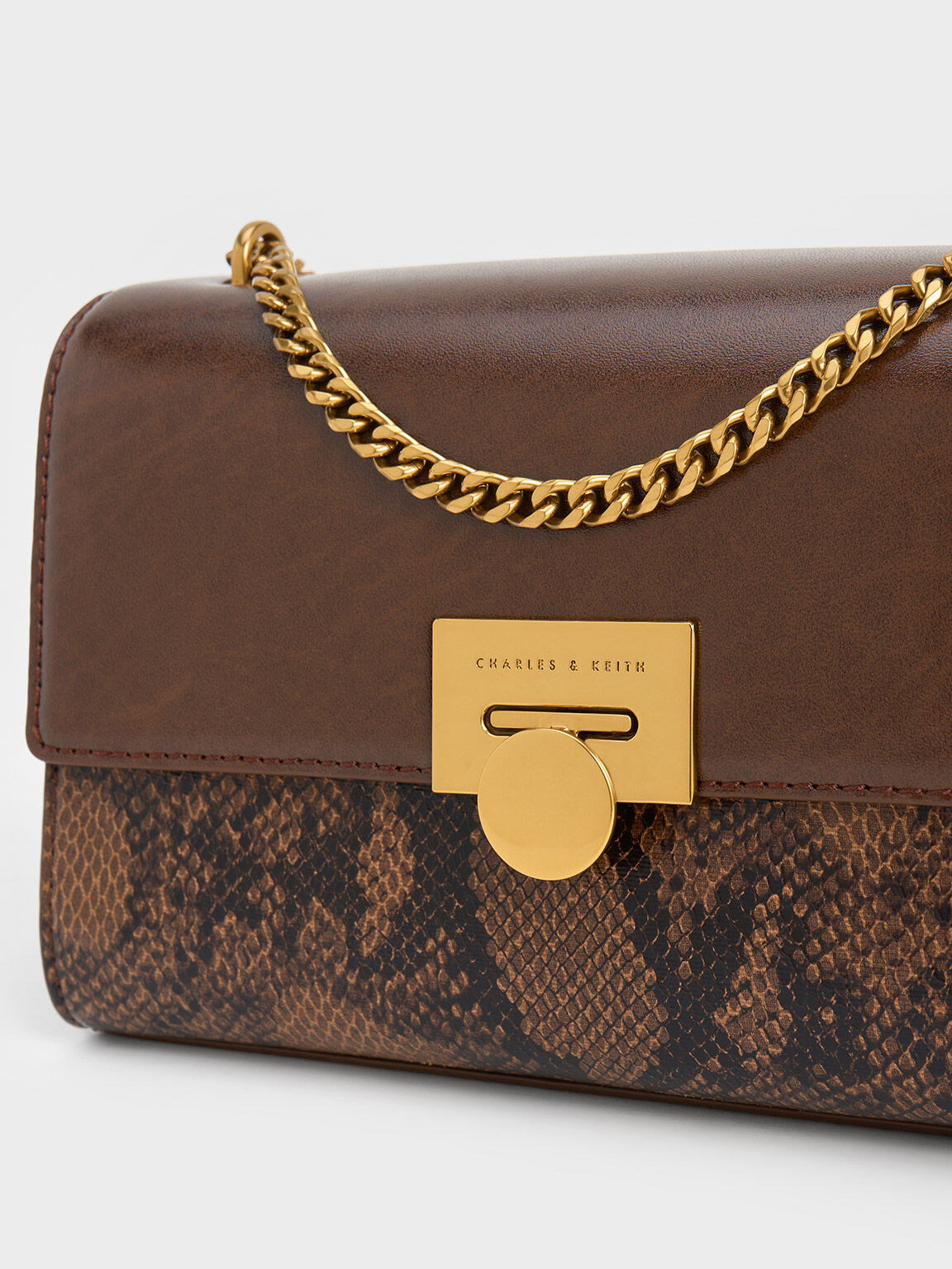 Brown Ebba Snake Print Chain Strap Bag CHARLES KEITH IN