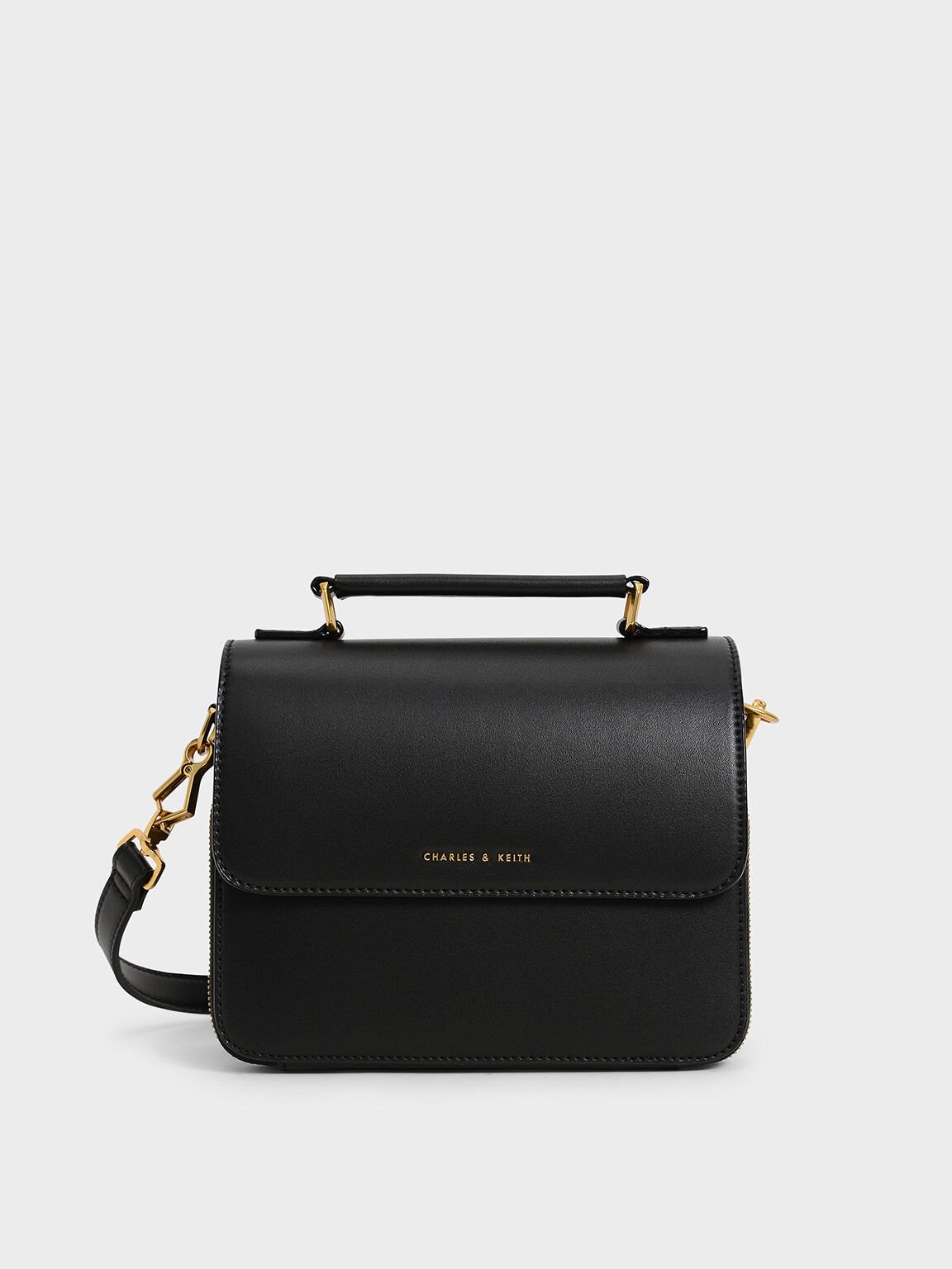 Buy CHARLES AND KEITH BLACK METAL TOP HANDLE BAG (WITH BOX) - Online