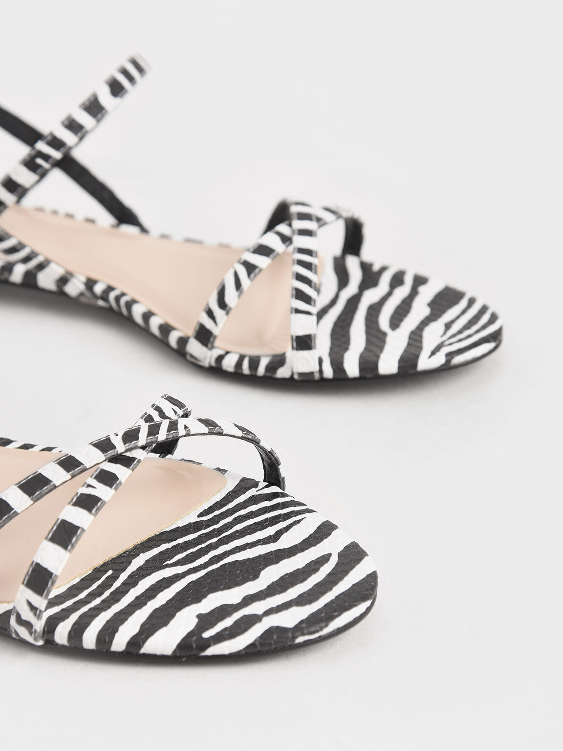 Zebra print flat sandals top