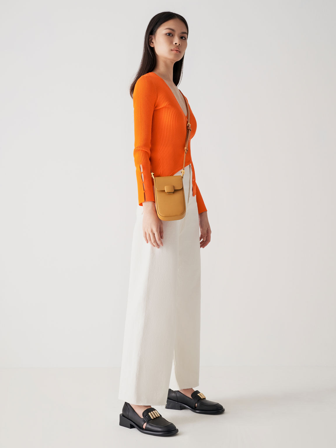 Buy Caprese Orange Solid Handheld Bag - Handbags for Women 1954449 | Myntra