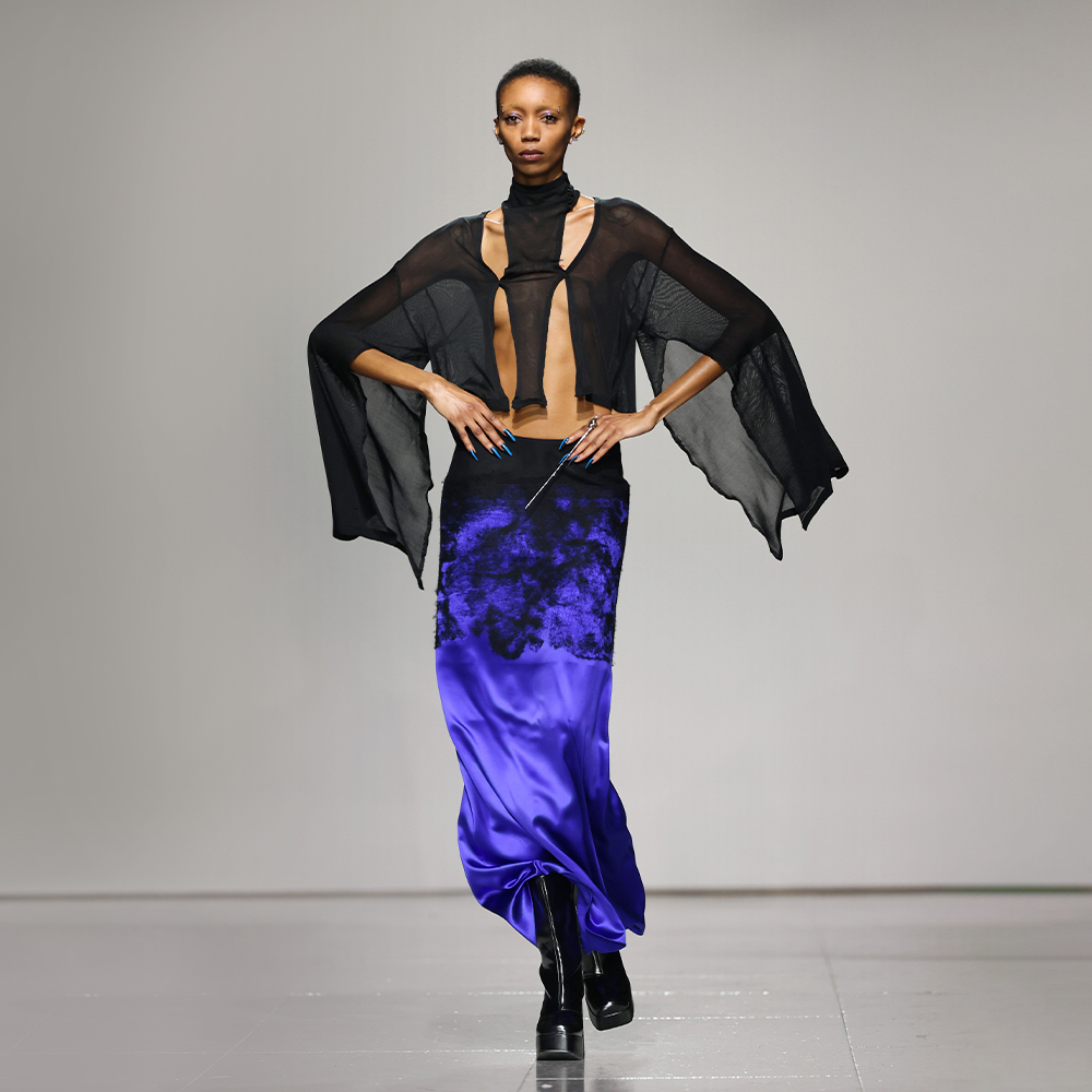 CHARLES & KEITH boots spotted at Chet Lo's Fall Winter 2023 presentation at London Fashion Week.
