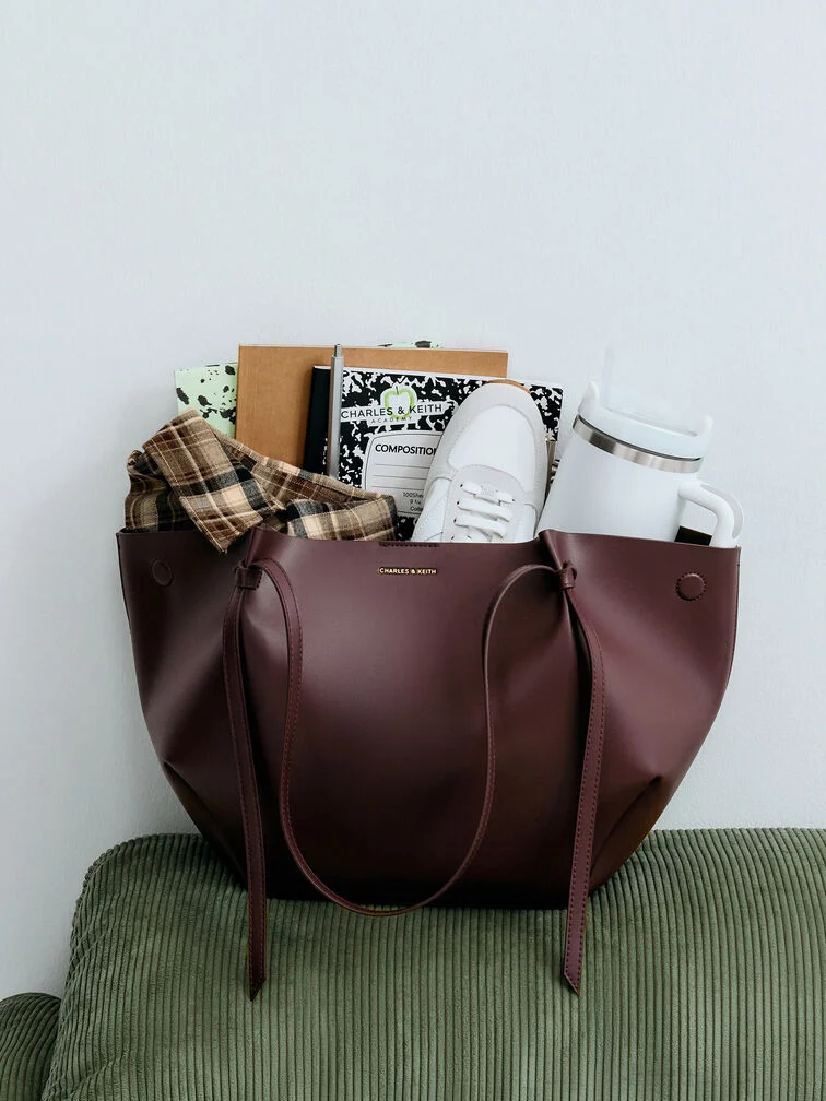 Extra-large tote bag in wineberry red, a versatile companion for campus life.