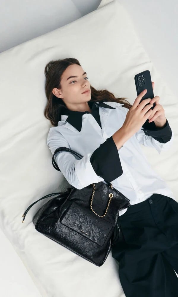 Women’s black Duo quilted braided-strap drawstring two-way backpack - CHARLES & KEITH