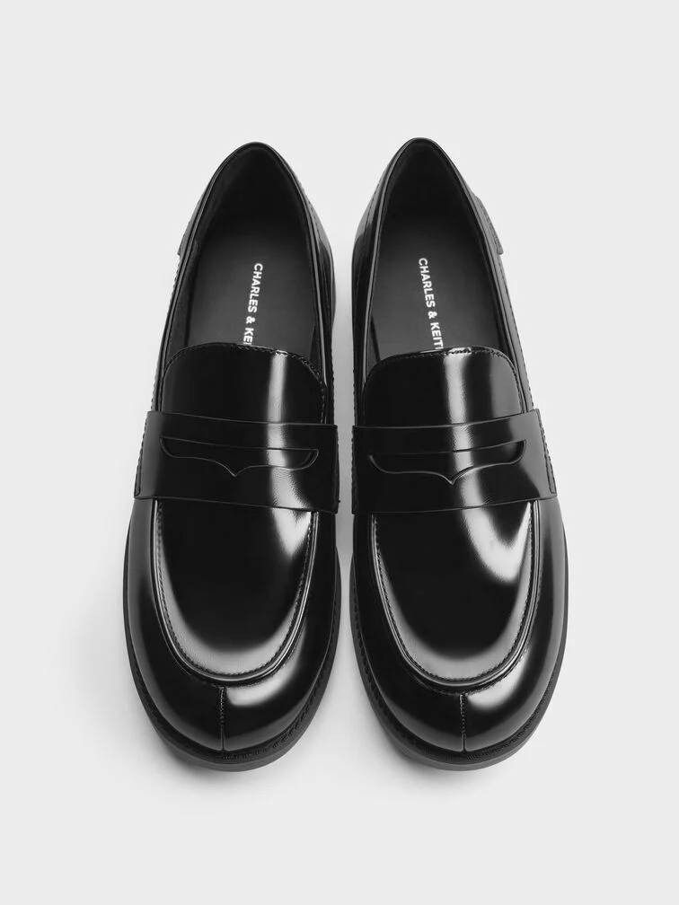  Classic black penny loafers work well for smart-casual fall weddings. 