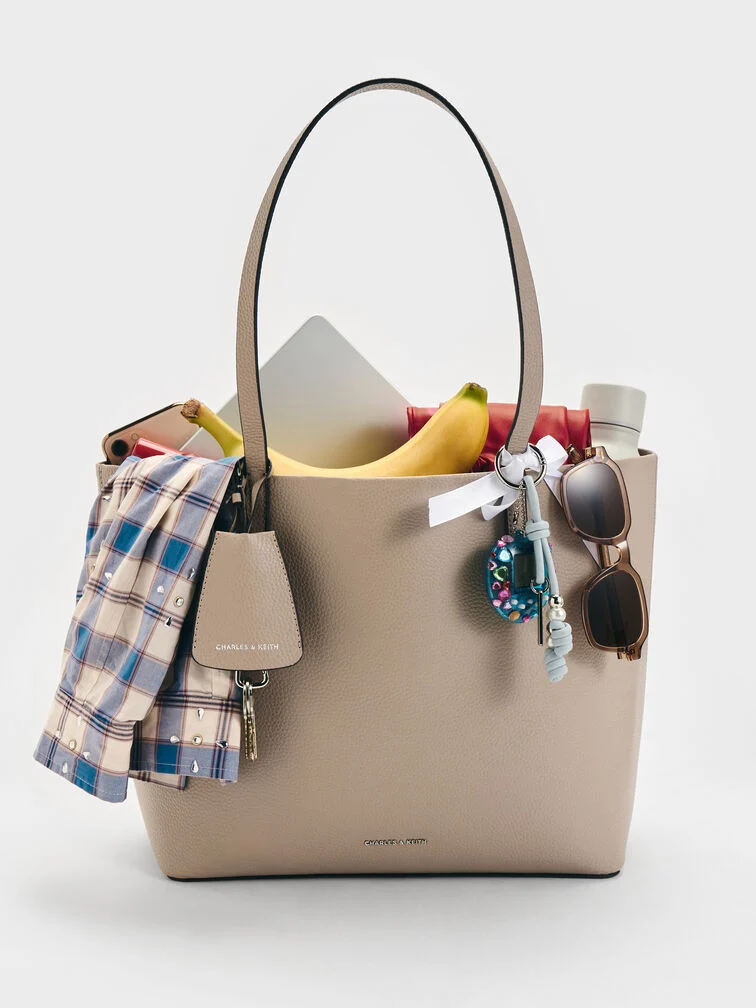 Spacious totes are practical Secret Santa gifts for women who carry everything. 