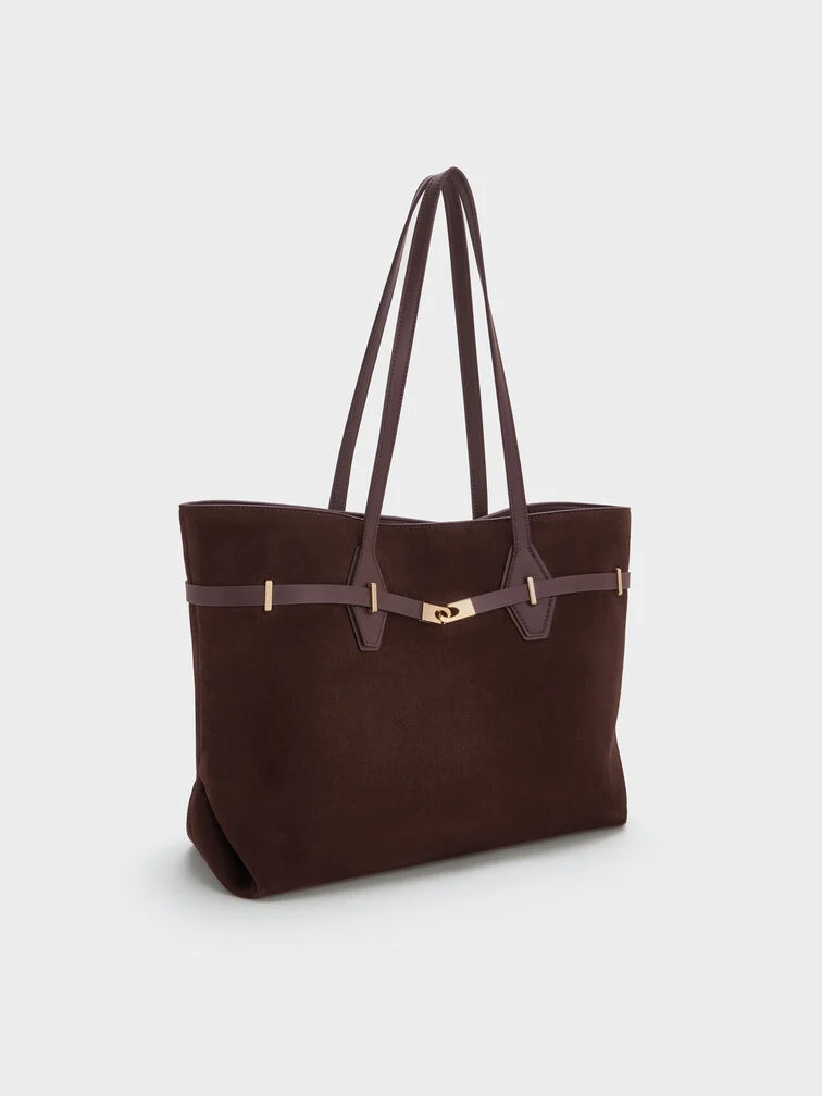 Made to carry heavier loads, tote bags are significantly bigger and roomier than East-West bags.