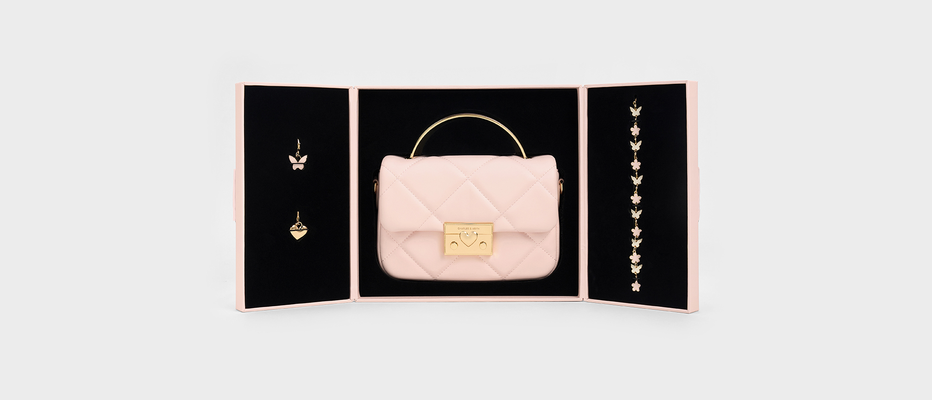 Women’s Quilted Box Top Handle Bag in pink – CHARLES & KEITH