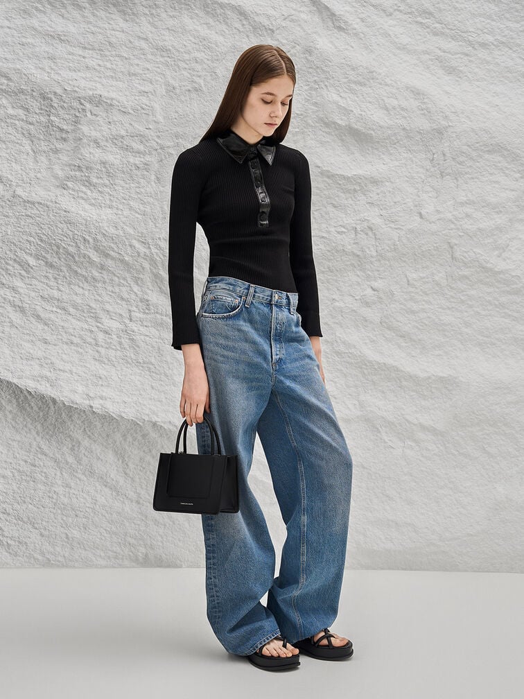 Strappy tubular wedge sandals in black, a chic choice for casual dressing.