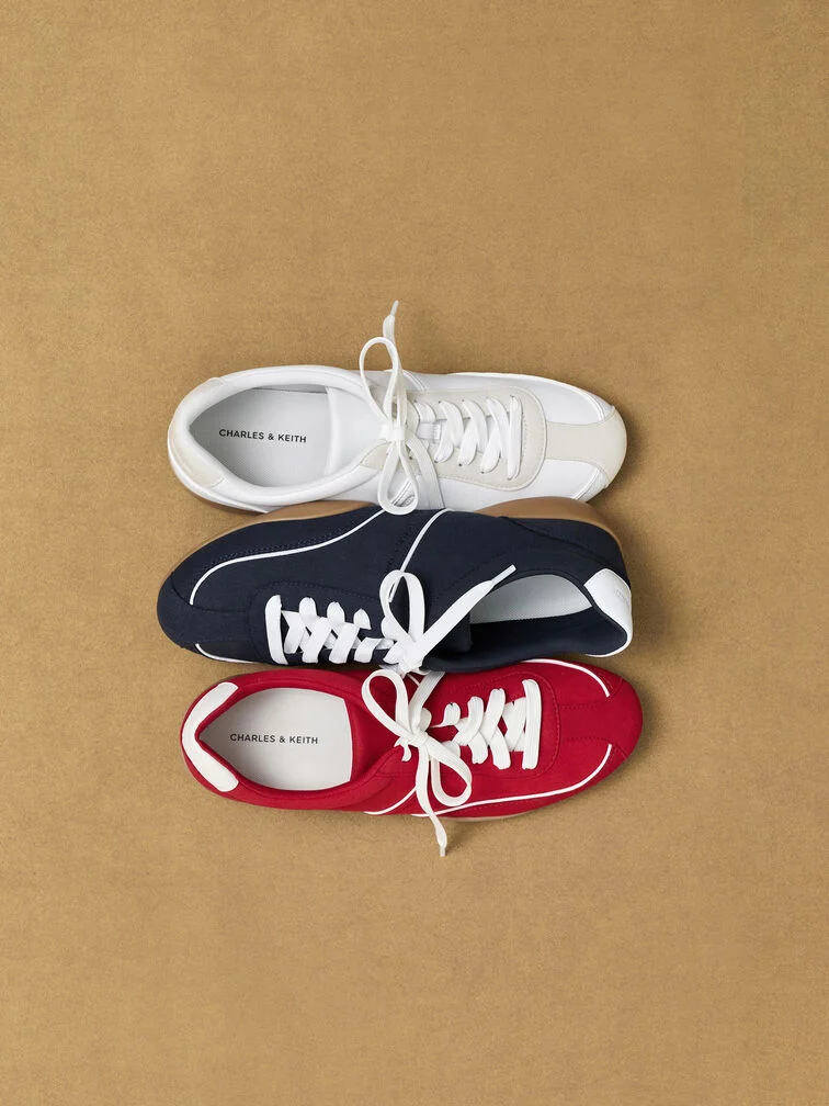 Sneakers are a classic footwear option that pairs well with casual double-denim outfits. 