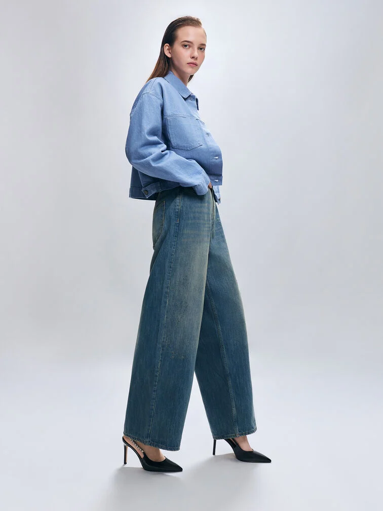 Sharp stiletto pumps will elevate a bold double-denim look and make it suitable for the office 