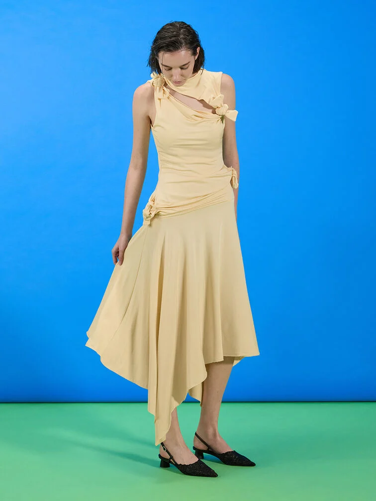Butter yellow dress styled with black slingback pumps. 