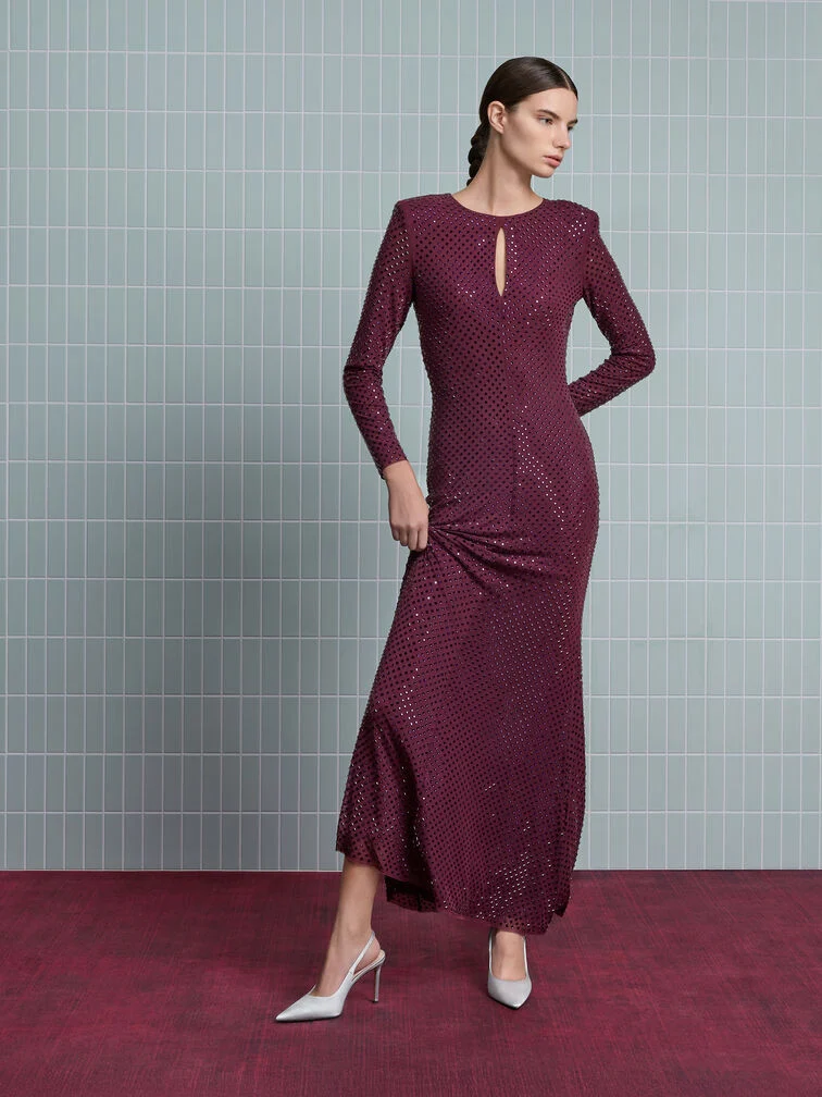 A sophisticated plum gown paired with classic white slingback pumps for special fall occasions.