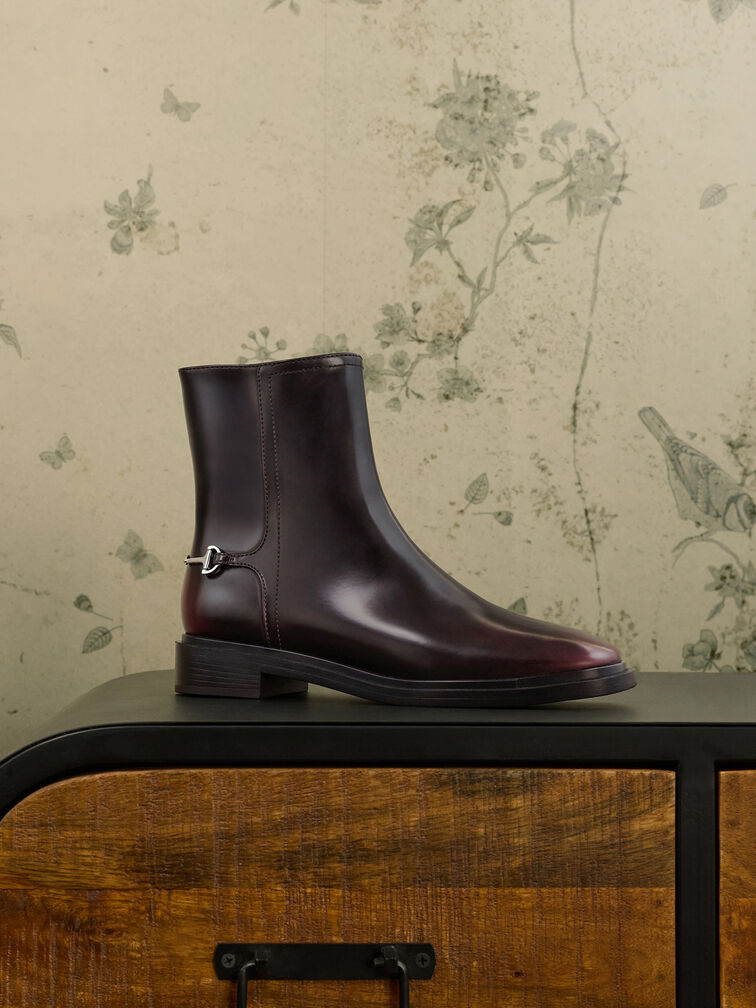 Side-zip ankle boots in a rich burgundy shade offers a classic fall look