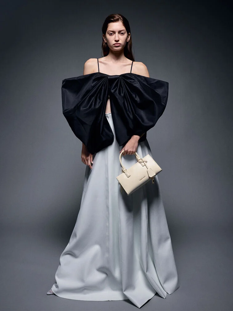  Women’s Kerry top handle bag, one of CHARLES & KEITH’s best-selling evening bags. 