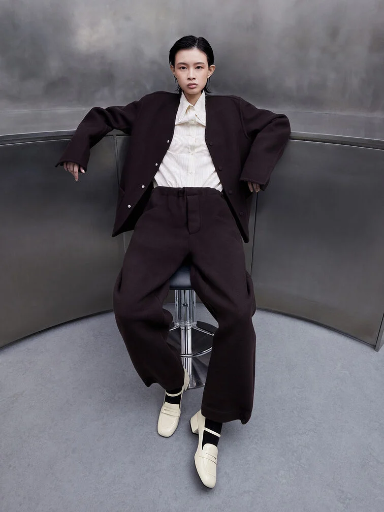 White Mary Janes loafers paired with a brown two-piece suit set - CHARLES & KEITH